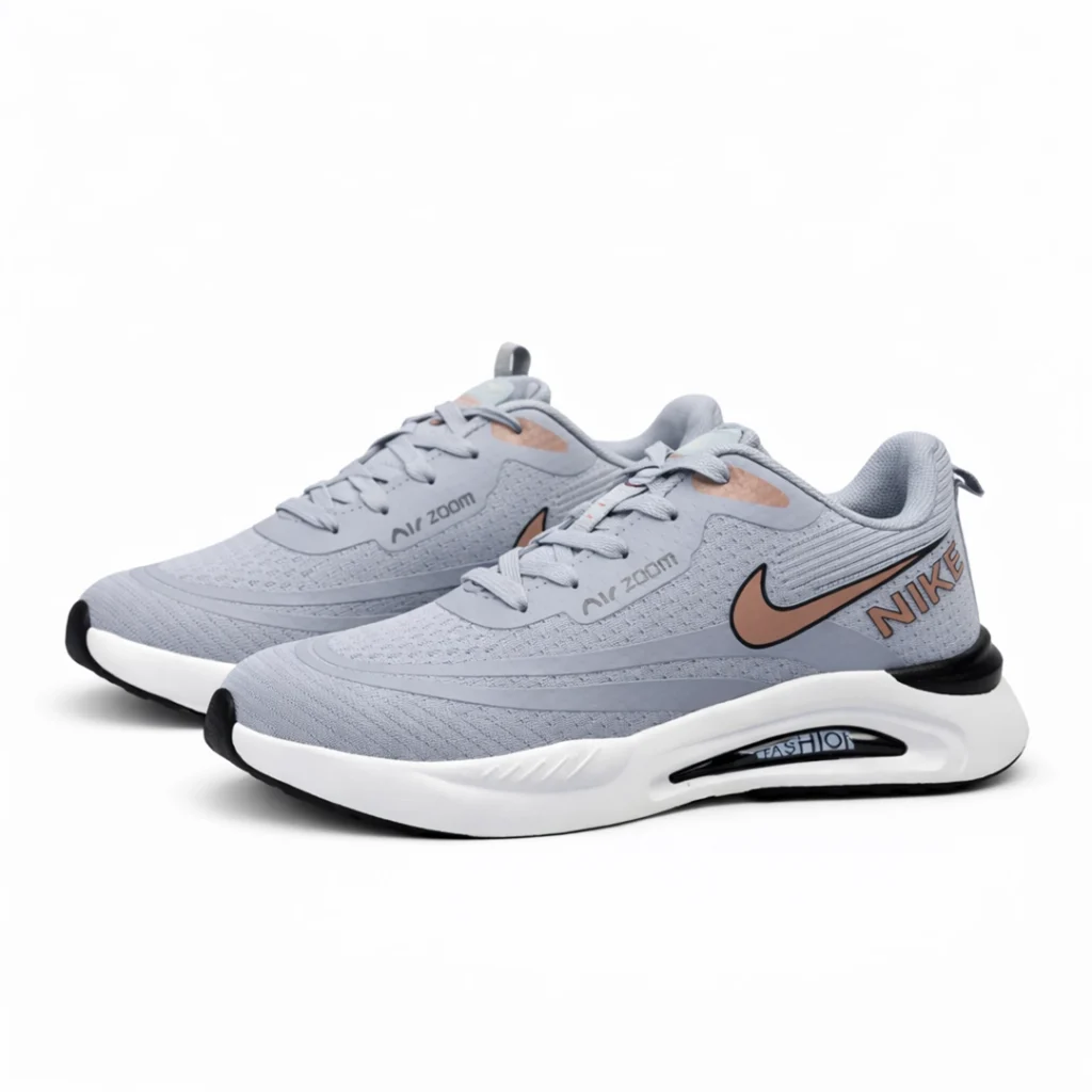 Pair of breathable mesh running shoes light grey color suitable for university and bike riding.