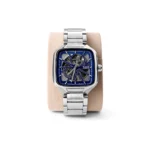 Luxury men's mechanical watch featuring a blue skeleton dial