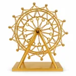 Golden Ferris wheel decorative showpiece on white background