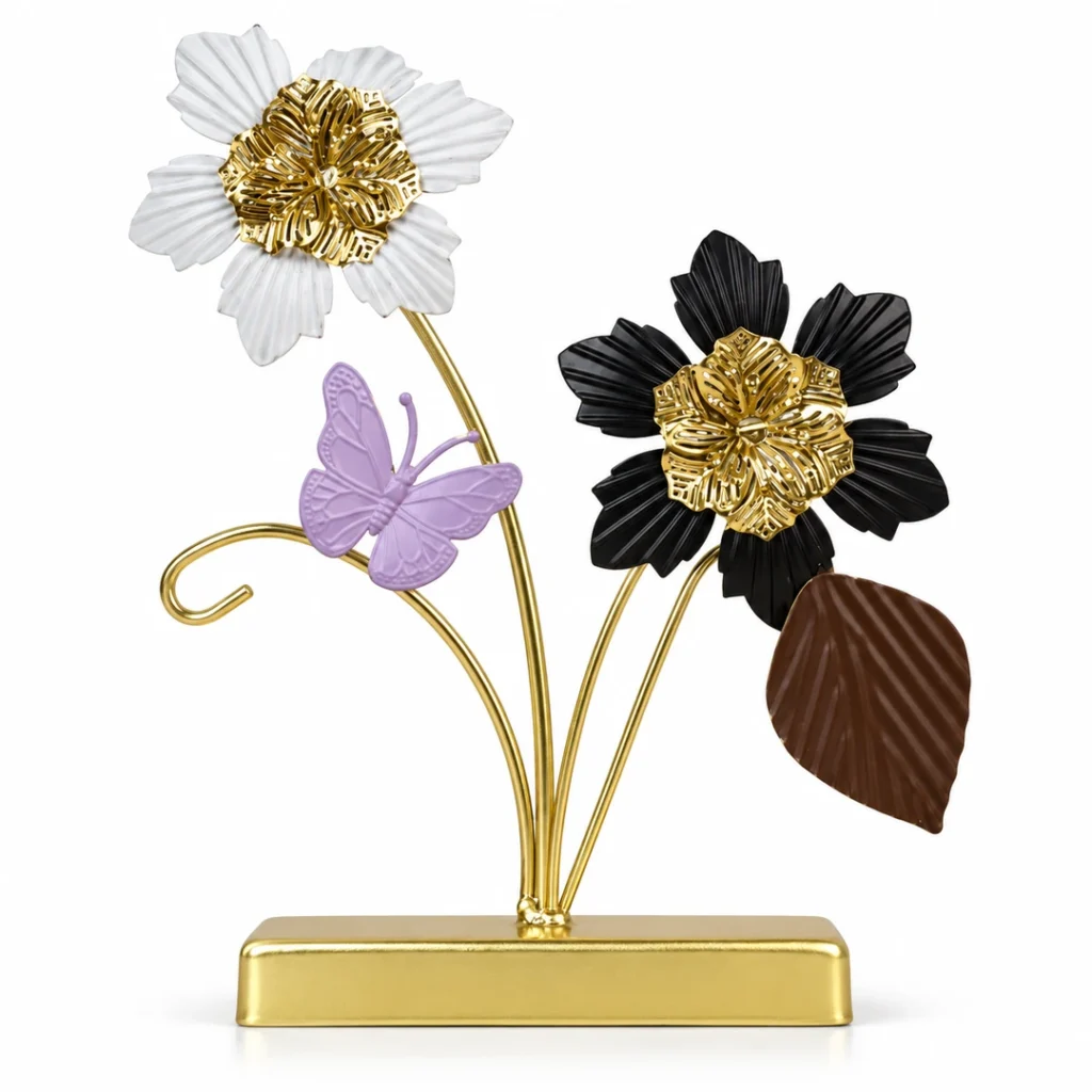 Luxury gold floral butterfly metal decorative showpiece with white and black flowers on white background