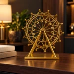 Golden Ferris wheel showpiece displayed on an executive desk