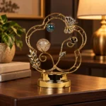Gold butterfly crystal light decorative showpiece with illuminated accents on wooden console