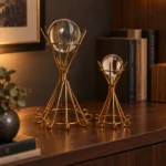 Gold crystal ball decorative showpiece set on premium bookshelf