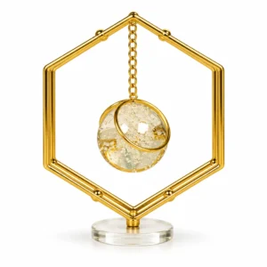 Gold hexagonal hanging crystal orb decorative showpiece on white background