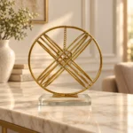 Gold orbital crystal ball decorative showpiece on luxury console