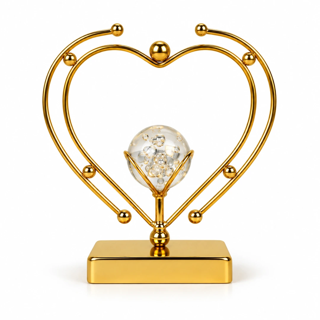 Luxury Gold Double Heart Crystal Ball Showpiece – White Background Luxury gold double heart crystal ball decorative showpiece on white background