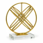 Luxury gold orbital crystal ball decorative showpiece on white background
