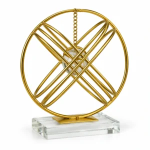 Luxury gold orbital crystal ball decorative showpiece on white background