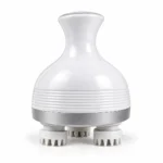 White ergonomic electric scalp massager with four soft silicone massage heads